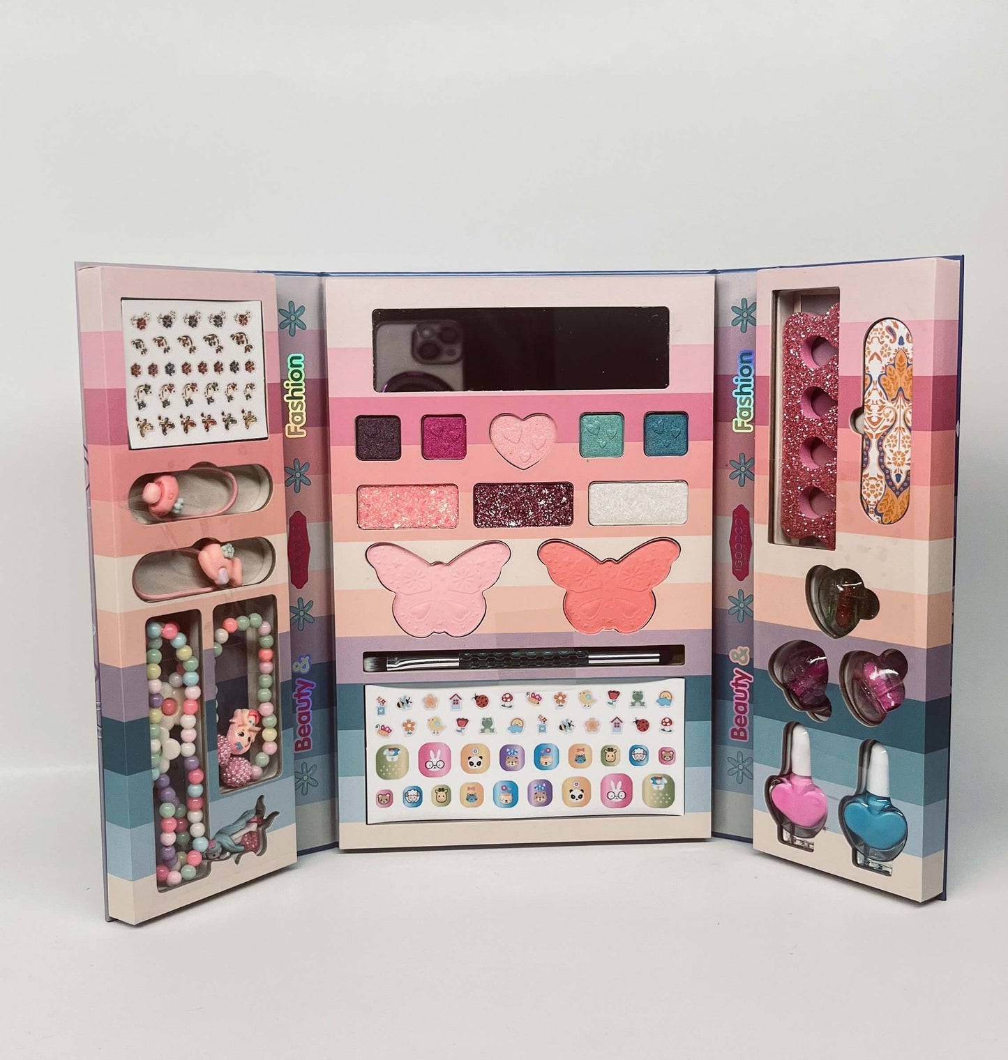 Kosmetikos rinkinys: šešėliai, plaukų gumelės, nagų lipdukai, lakai ir apyrankės